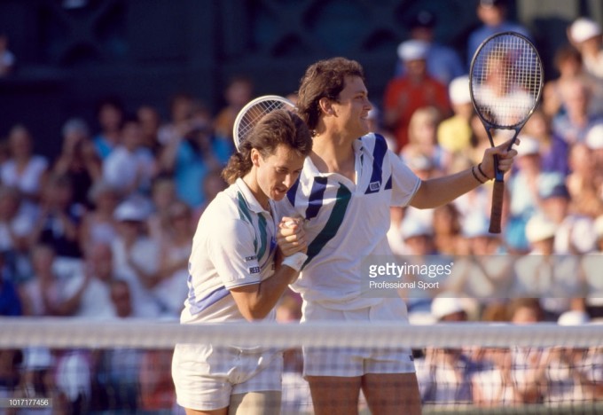 LONDON, ENGLAND - 1987: Ken Flach (left) and Robert Seguso of the USA celebrate after defeating Guy 